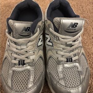 New Balance Kids Metallic Gray Sneakers
